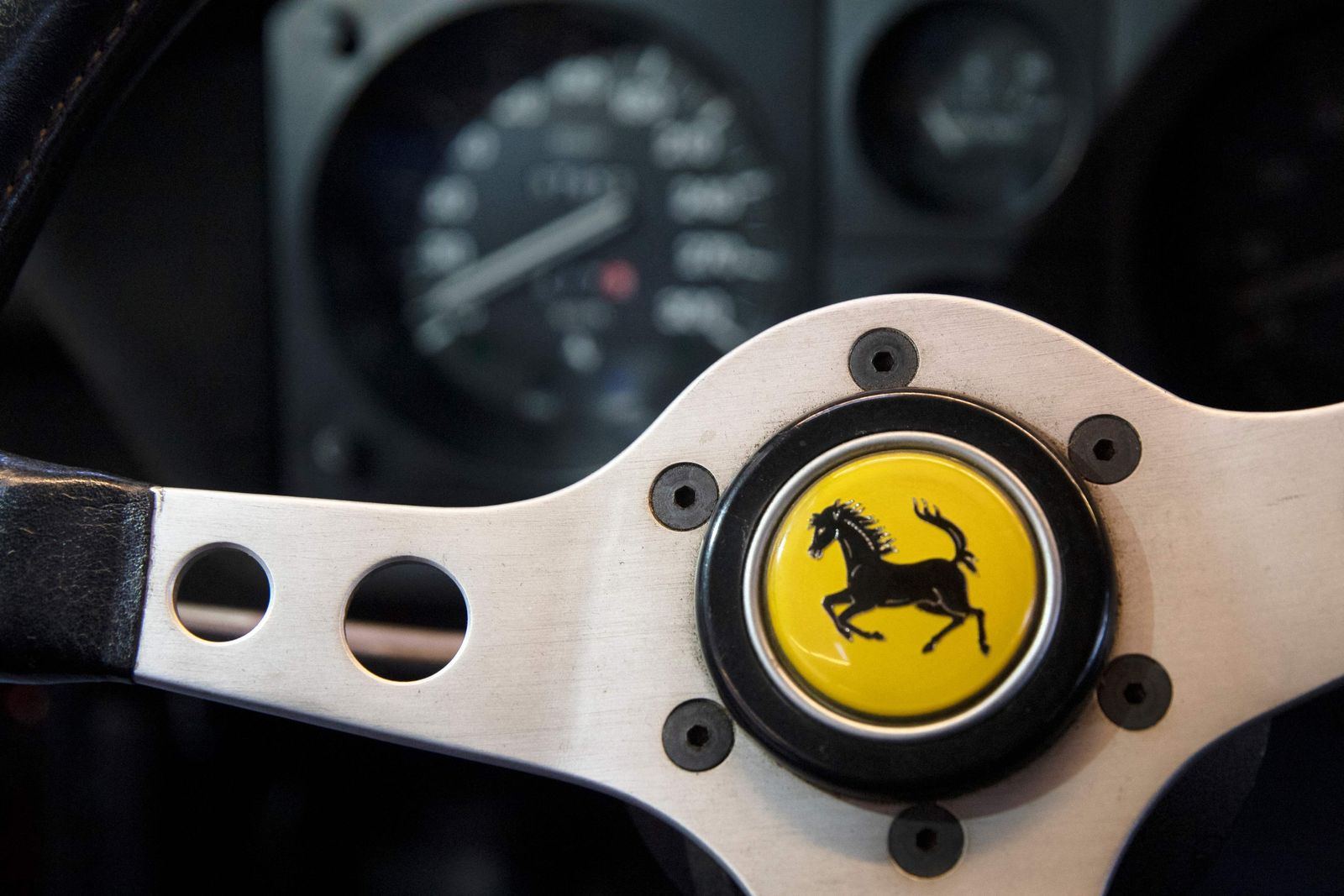 Inside view of the 1973 Ferrari 365 GT4 2+2 car once owned by Austrian Formula One driver Niki Lauda standing in the hall of the Dorotheum auction house in Voesendorf near Vienna, Lower Austria, on December 6, 2022. - The 1973 Ferrari 365 GT4 2+2 will be auctioned off online on Wednesday, December 7, 2022, with current bids already at almost triple the starting price of 30,000 euro ($31,500). Three-time Formula One world champion Niki Lauda received the car in 1973 after signing on with Ferrari as F1 driver. Originally silver colour, a subsequent owner changed the Ferrari's colour to red. Austrian F1 legend Lauda died in 2019 at the age of 70. (Photo by Alex HALADA / AFP)