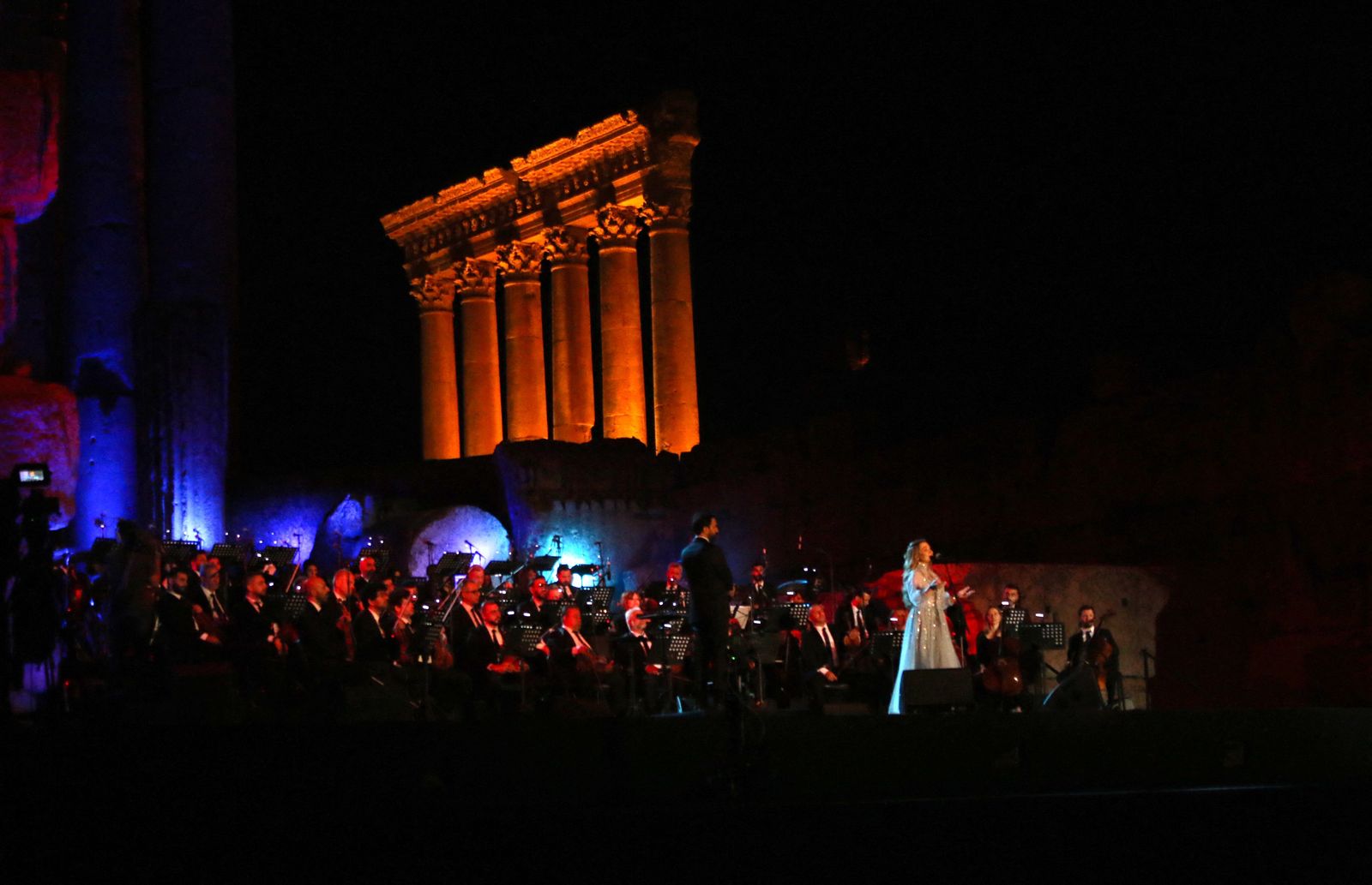 Lebanese singer Soumaya Baalbaki performs on the opening night of the Baalbek festival in the Roman ruins of the eponymous ancient city in Lebanon's Bekaa valley, on July 8, 2022. (Photo by AFP) - AFP