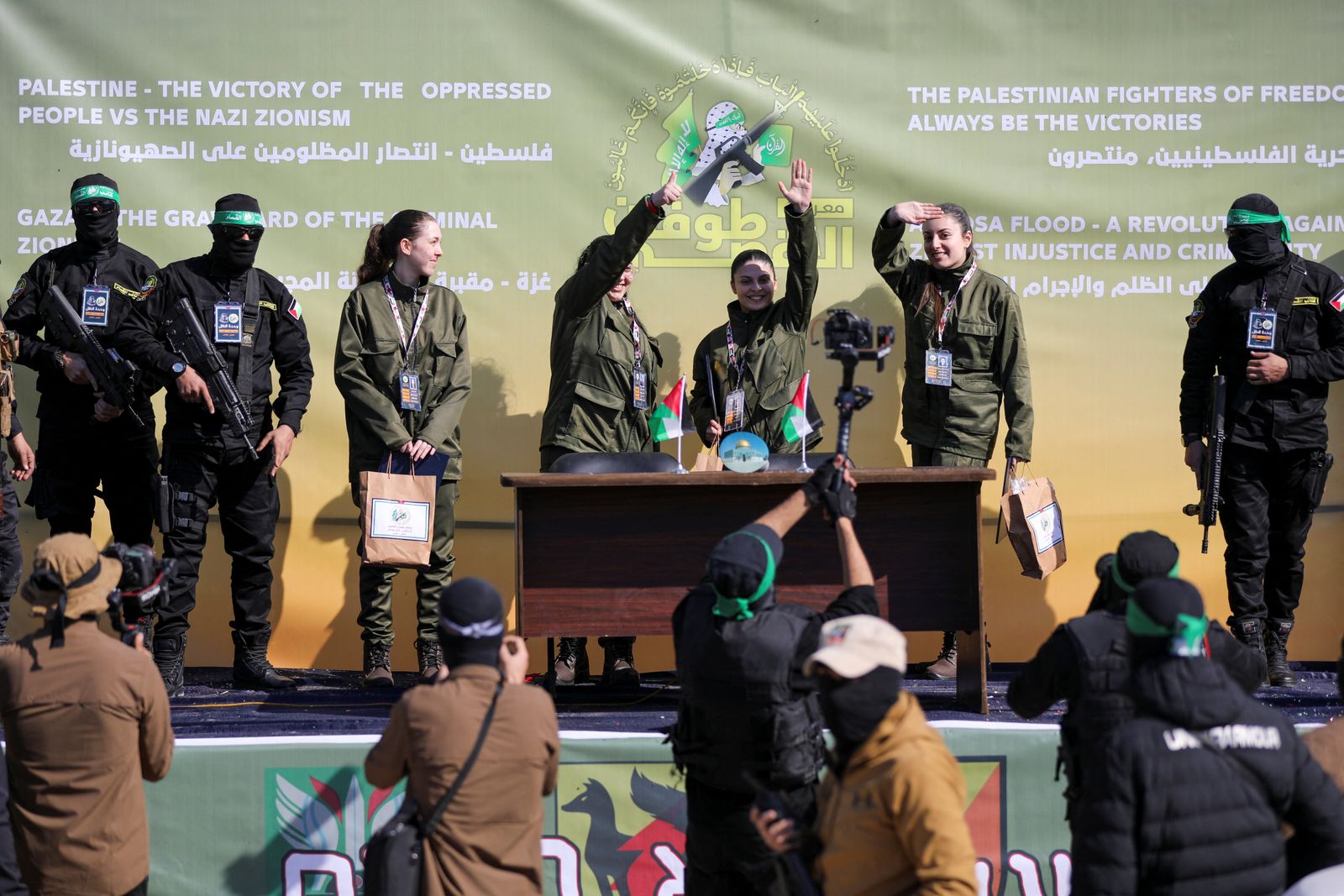 Four female Israeli soldiers, who had been held in Gaza since the deadly October 7, 2023 attack, are released by Hamas militants as part of a ceasefire and a hostages-prisoners swap deal between Hamas and Israel, in Gaza City, January 25, 2025. REUTERS/Dawoud Abu Alkas