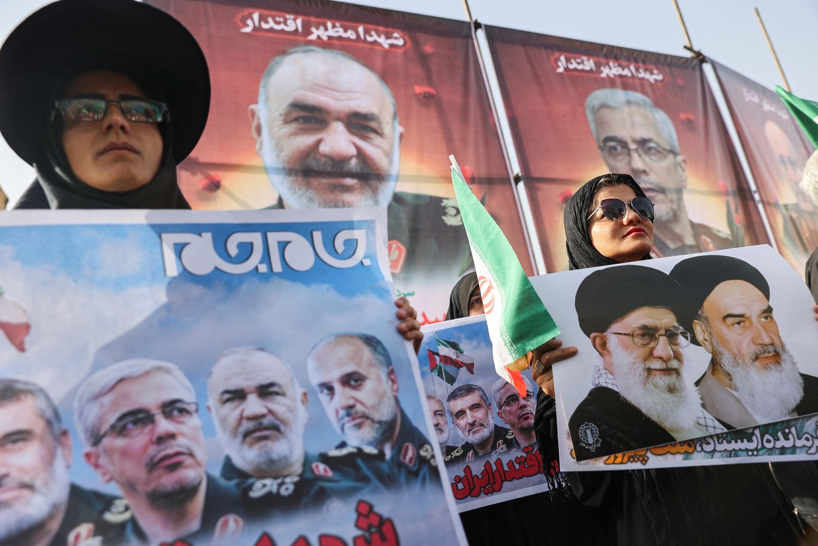 People attend the funeral procession of Iranian military commanders, nuclear scientists and others killed in Israeli strikes, in Tehran, Iran, June 28, 2025. Majid Asgaripour/WANA (West Asia News Agency) via REUTERS   ATTENTION EDITORS - THIS PICTURE WAS PROVIDED BY A THIRD PARTY