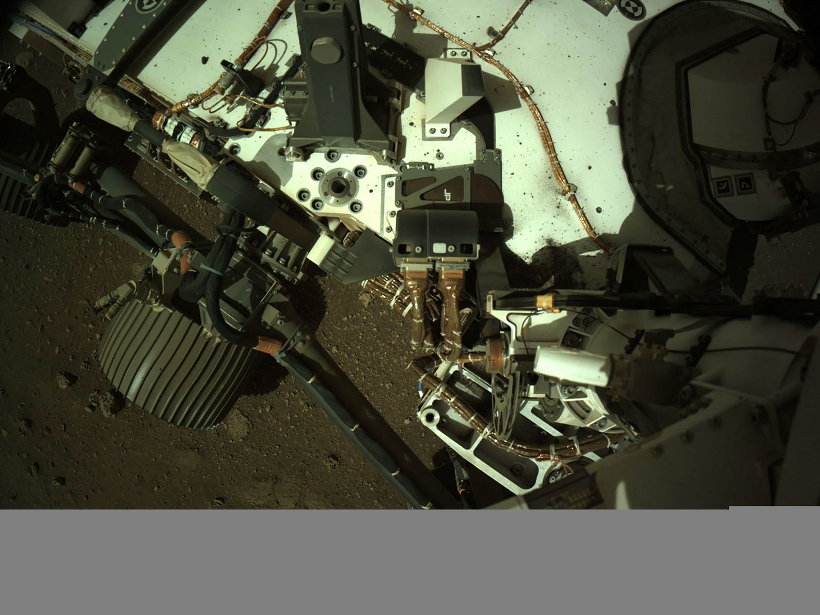 This NASA photo released on March 1, 2021 shows NASA's Mars Perseverance rover as it acquired this image using its onboard Left Navigation Camera (Navcam). - The camera is located high on the rover's mast acquired on March 1, 2021 (Sol 10) at the local mean solar time of 14:26:53, and aids in driving. (Photo by Handout / NASA/JPL-CALTECH / AFP) / RESTRICTED TO EDITORIAL USE - MANDATORY CREDIT 