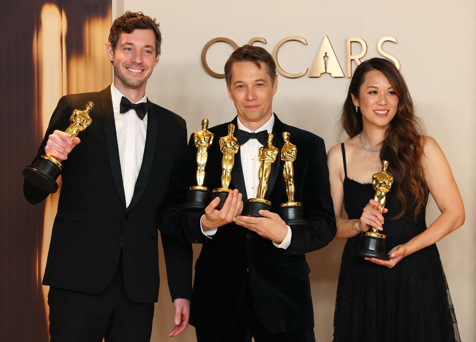 Director Sean Baker poses with the Oscars for Best Picture, Best Director, Best Film Editing and Best Original Screenplay for 'Anora' as producers Alex Coco and Samantha Quan pose with the Oscar for Best Picture for 'Anora' in the Oscars photo room at the 97th Academy Awards in Hollywood, Los Angeles, California, U.S., March 2, 2025. REUTERS/Daniel Cole