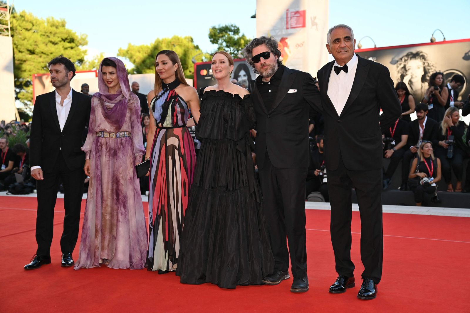 President of the Venezia 79 International Jury, US actress Julianne Moore (C) arrives with (From L) member of the Venezia 79 International Jury, Spanish director Rodrigo Sorogoyen, member of the Venezia 79 International Jury, Iranian actress Leila Hatami, member of the Venezia 79 International Jury, French director Audrey Diwan, member of the Venezia 79 International Jury, Argentine director Mariano Cohn and member of the Venezia 79 International Jury, Italian director Leonardo Di Costanzo on September 10, 2022 for the closing ceremony of the 79th Venice International Film Festival at Lido di Venezia in Venice, Italy. (Photo by Andreas SOLARO / AFP) - AFP