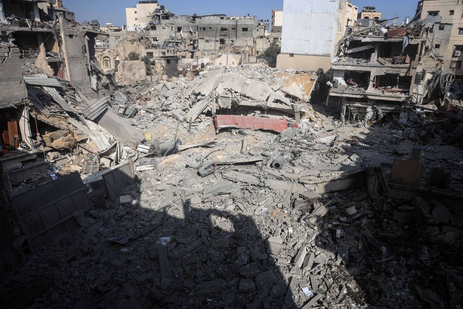 Destroyed residential buildings following Israeli airstrikes in the Shuja'iyya district east of Gaza City, Gaza, on Thursday, Nov. 9, 2023. French President Emmanuel Macron told the BBC there was �no justification� for the bombing of Gaza and a cease-fire would be in the interests of Israel. Photographer: Ahmad Salem/Bloomberg