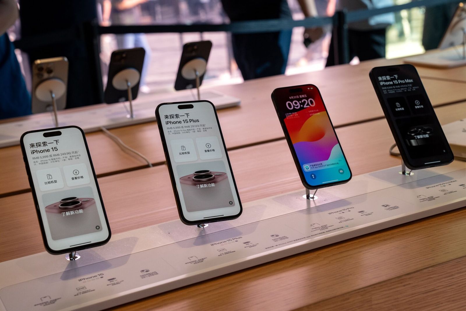 Apple Inc. iPhone 15 smartphones on display at an Apple store in Beijing, China, on Friday, Sept. 22, 2023. Apple's latest iPhones and watches went on sale today, a test of whether a new smartphone design and modest smartwatch changes can help return the company to growth. Photographer: Andrea Verdelli/Bloomberg