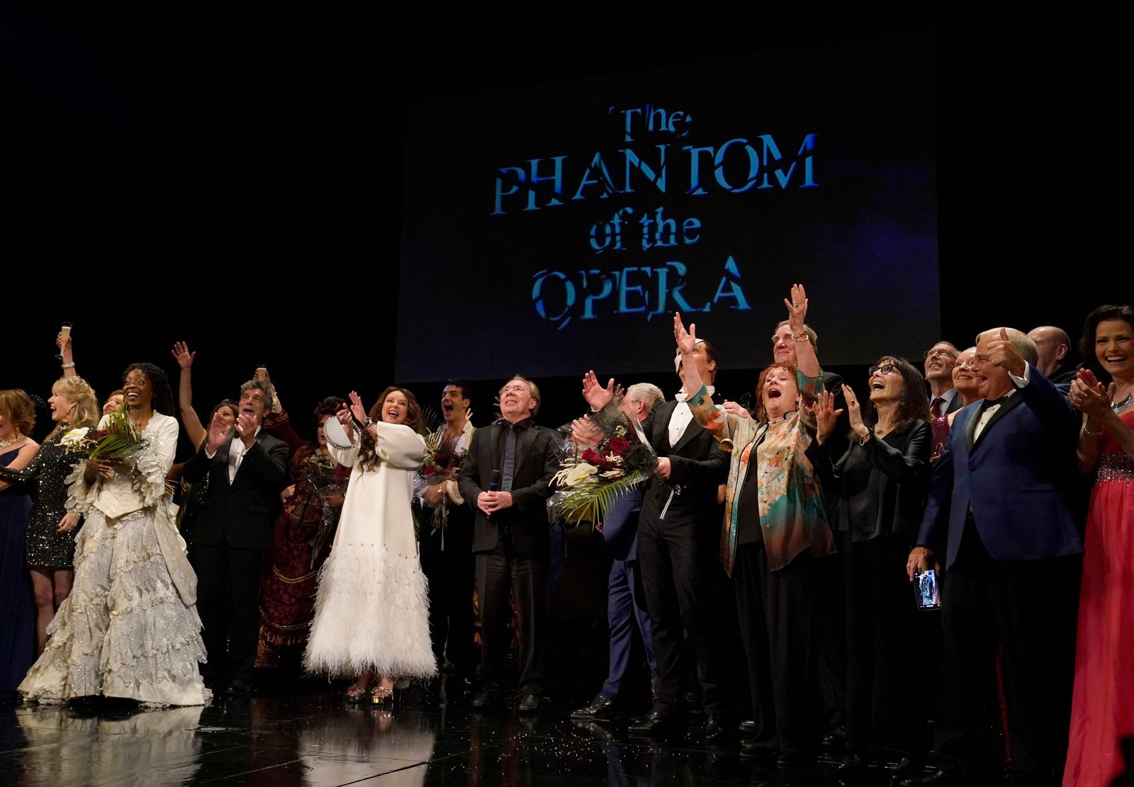 Sarah Brightman, Andrew Lloyd Webber, Cameron Mackintosh and Laird Mackintosh as the Phantom, take a bow at the end of the final performance of the musical �Phantom of the Opera� at the Majestic Theater in New York City on April 16, 2023. (Photo by TIMOTHY A. CLARY / AFP) - AFP