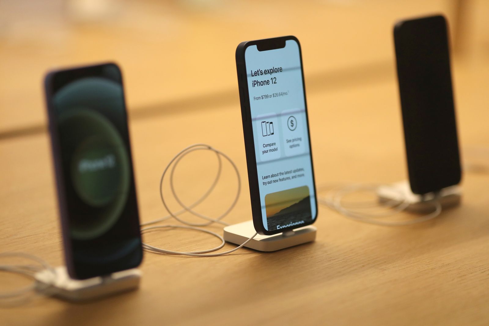 IPhone 12 phones are seen at the new Apple Store on Broadway in downtown Los Angeles - REUTERS