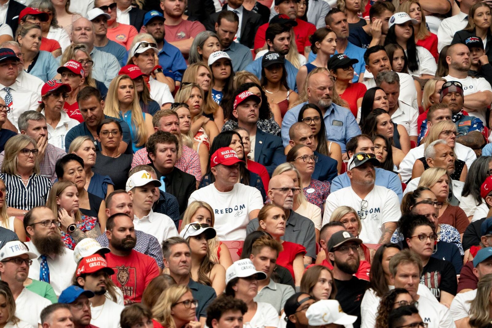 Mourners during a memorial service for Turning Point USA founder Charlie Kirk at State Farm Stadium in Glendale, Arizona, US, on Sunday, Sept. 21, 2025. President Donald Trump proclaimed Charlie Kirk a 'martyr for American freedom' in a memorial ceremony to commemorate the political activist as Erika Kirk said she forgave the man who gunned down her husband. Photographer: Rebecca Noble/Bloomberg