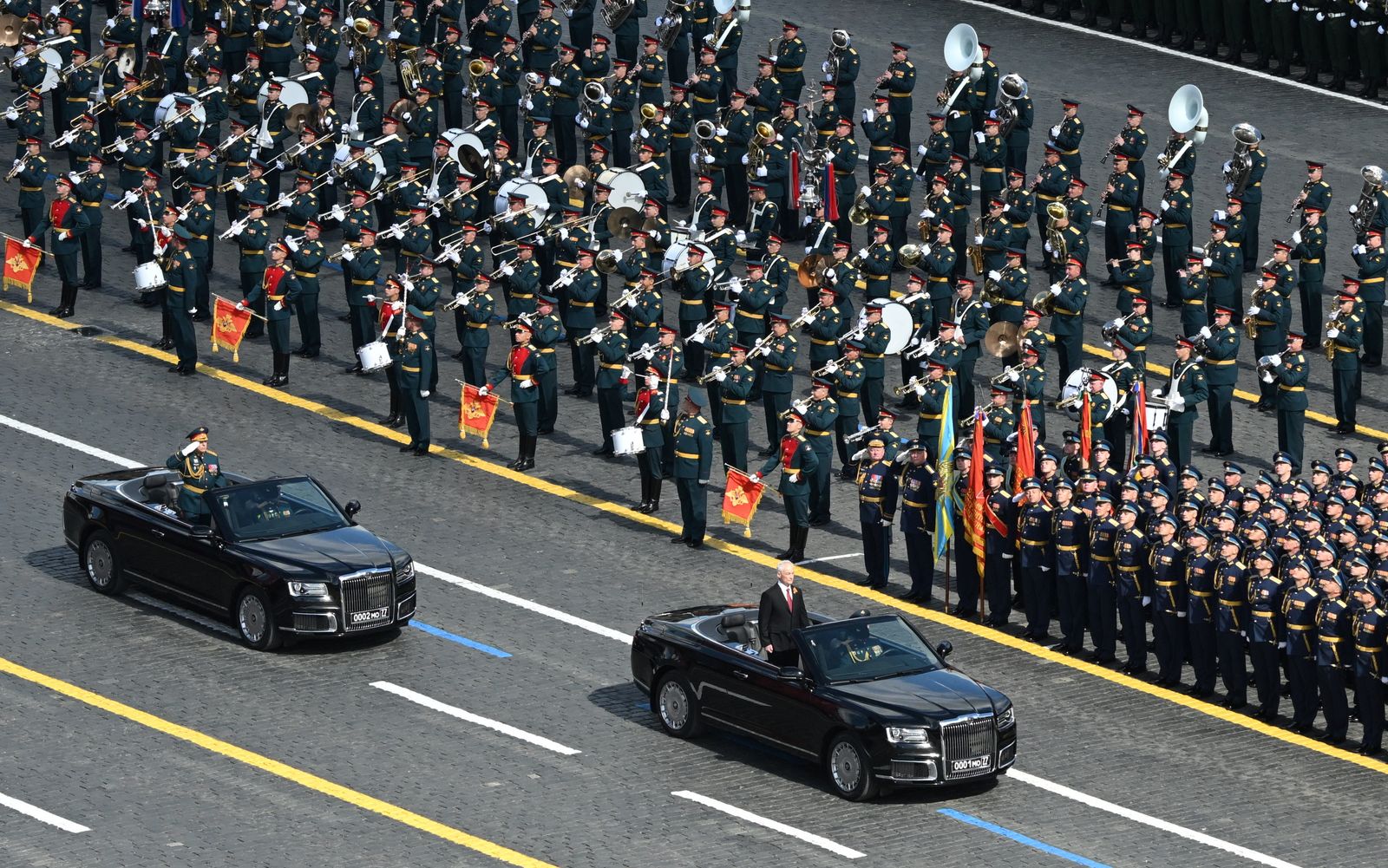 Russia's Defence Minister Andrei Belousov and Chief of the Russian Land Forces Oleg Salyukov ride on Aurus cabriolets during a military parade on Victory Day, marking the 80th anniversary of the victory over Nazi Germany in World War Two, in Red Square in central Moscow, Russia, May 9, 2025. Maxim Bogodvid/Host agency RIA Novosti/Handout via REUTERS ATTENTION EDITORS - THIS IMAGE WAS PROVIDED BY A THIRD PARTY.