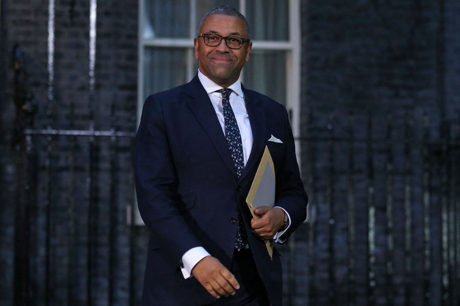 Britain's Foreign Secretary James Cleverly leaves 10 Downing Street after a meeting with Britain's new Prime Minister Liz Truss in central London, on September 6, 2022. - Liz Truss on Tuesday officially became Britain's new prime minister, at an audience with head of state Queen Elizabeth II after the resignation of Boris Johnson. The former foreign secretary, 47, was seen in an official photograph shaking hands with the monarch to accept her offer to form a new government and become the 15th prime minister of her 70-year reign. (Photo by ISABEL INFANTES / AFP) - AFP