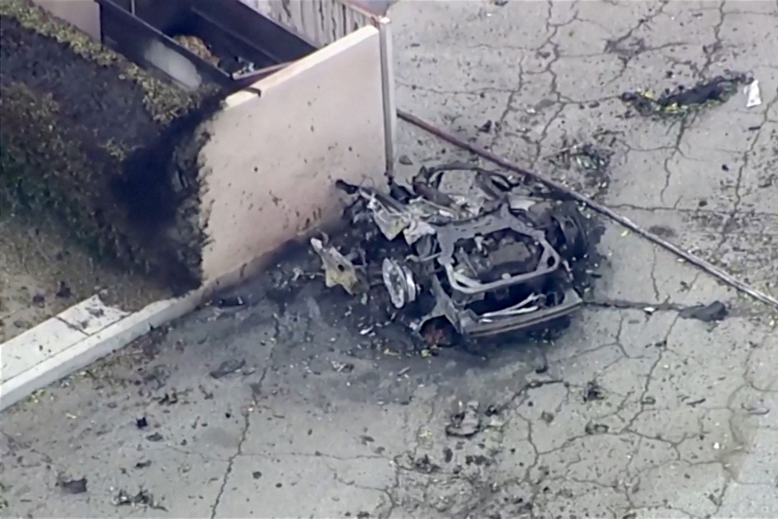 A destroyed car remains after what the Mayor described as a bomb exploded near a reproductive health facility in Palm Springs, California, U.S. May 17, 2025 in a still image from video.   ABC AFFILIATE KABC via REUTERS  NO RESALES. NO ARCHIVES. MANDATORY CREDIT