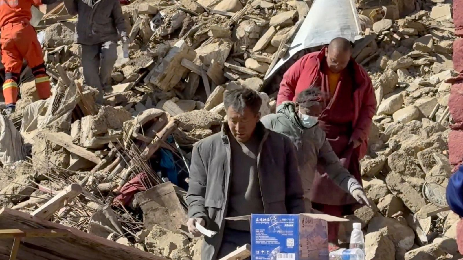 Rescue teams work amidst rubble in the aftermath of an earthquake in a location given as Shigatse City, Tibet Autonomous Region, China, in this screengrab obtained from a handout video released on January 7, 2025. Tibet Fire and Rescue/Handout via REUTERS    THIS IMAGE HAS BEEN SUPPLIED BY A THIRD PARTY. NO RESALES. NO ARCHIVES. MANDATORY CREDIT