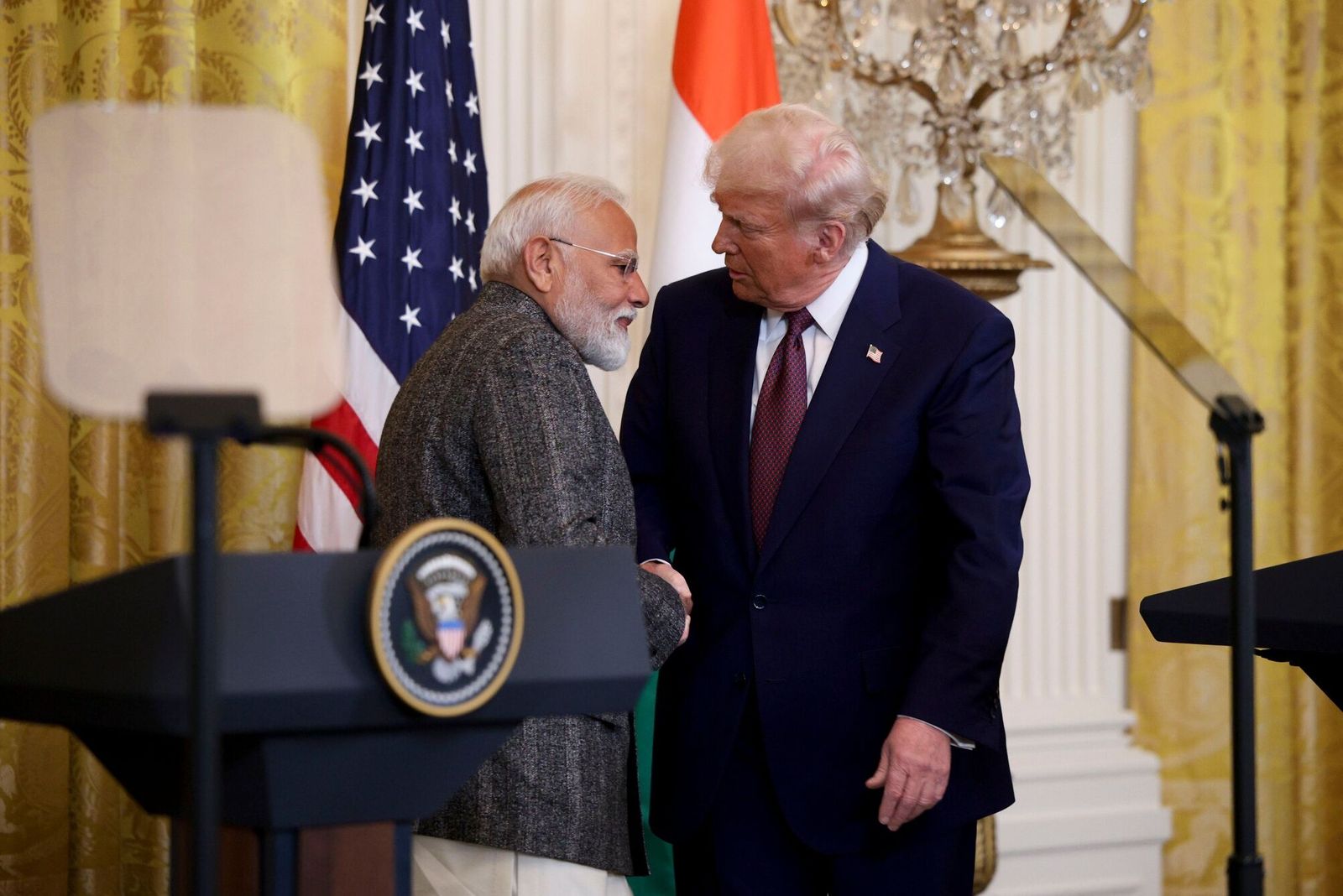 US President Donald Trump, right, and Narendra Modi, India's prime minister, shake hands during a news conference in the East Room of the White House in Washington, DC, US, on Thursday, Feb. 13, 2025. The head of the world�s most populous nation faces a minefield in negotiations with Trump, who has signaled that India remains a potential tariff target despite a deepening partnership between the two countries.�Photographer: Francis Chung/Politico/Bloomberg