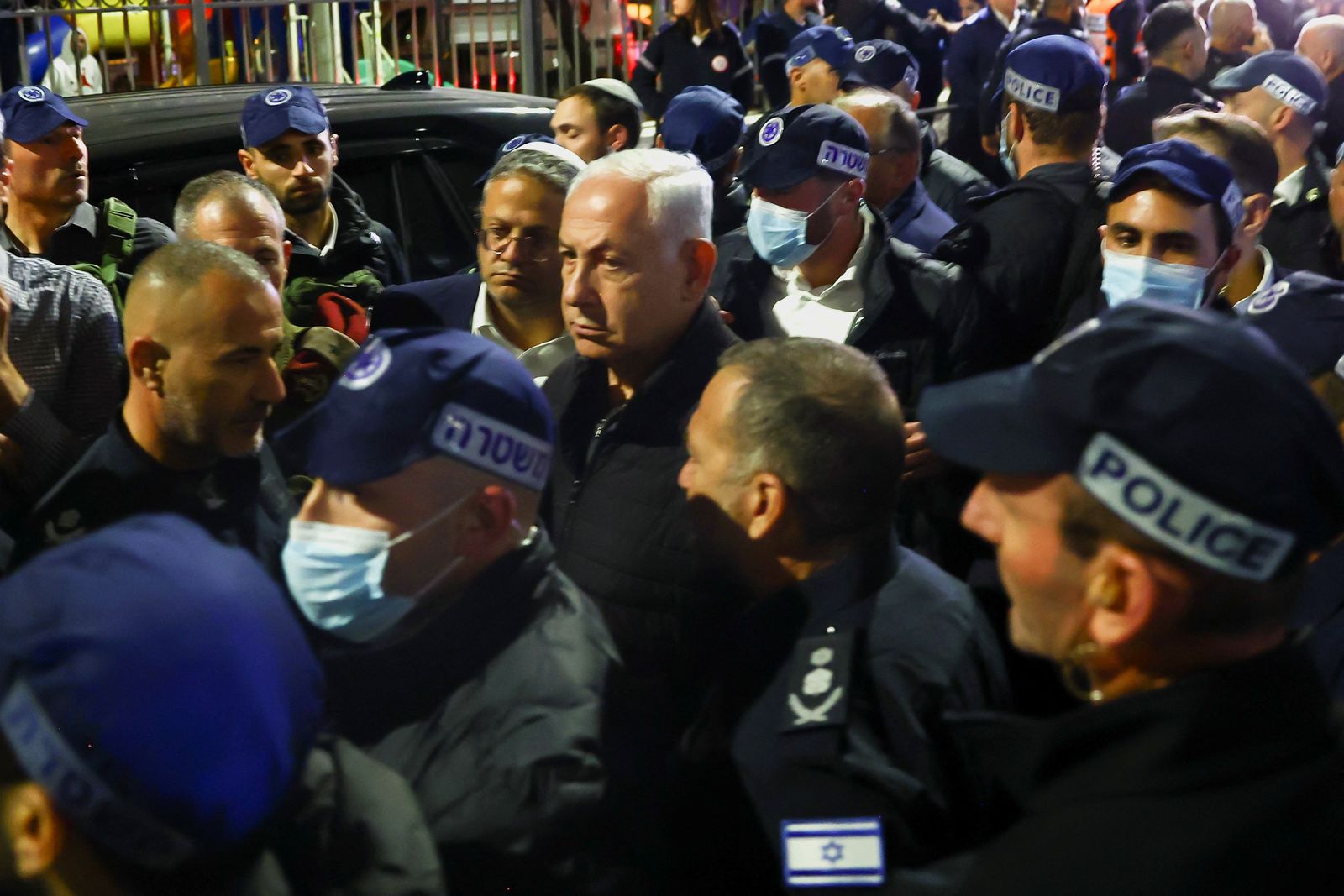 Israeli Prime Minister Benjamin Netanyahu visits the scene of a shooting attack in Neve Yaacov which lies on occupied land that Israel annexed to Jerusalem after the 1967 Middle East war January 27, 2023. REUTERS/Ronen Zvulun - REUTERS