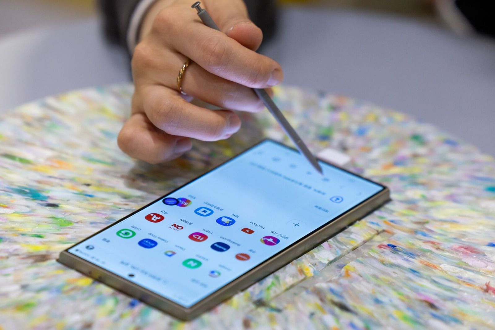 An attendee tries out a Samsung Electronics Co. Galaxy S24 Ultra smartphone at the World IT Show in Seoul, South Korea, on Wednesday, April 17, 2024. The show runs through April 19. Photographer: SeongJoon Cho/Bloomberg