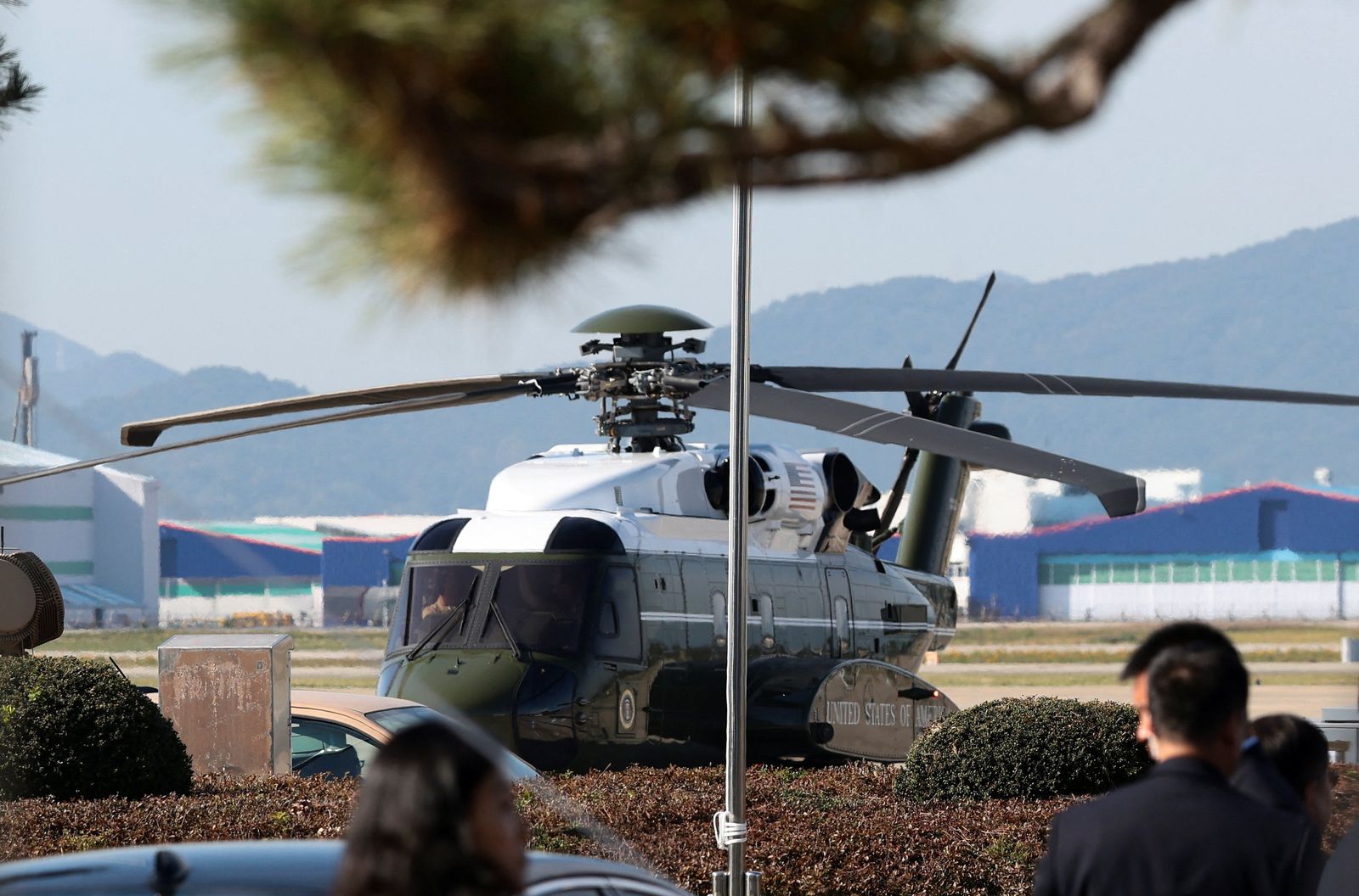Marine One, carrying U.S. President Donald Trump, arrives at Gimhae International Airport where Trump will hold a bilateral meeting with Chinese President Xi Jinping before departing South Korea, on the sidelines of the Asia-Pacific Economic Cooperation (APEC) summit, in Busan, South Korea, October 30, 2025. REUTERS/Evelyn Hockstein