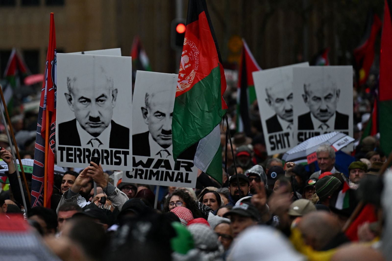 Protesters gather to walk across the Sydney Harbour Bridge during the Palestine Action Group's March for Humanity in Sydney, Australia August 3, 2025. AAP/Dean Lewins via REUTERS    ATTENTION EDITORS - THIS IMAGE WAS PROVIDED BY A THIRD PARTY. NO RESALES. NO ARCHIVE. AUSTRALIA OUT. NEW ZEALAND OUT. NO COMMERCIAL OR EDITORIAL SALES IN NEW ZEALAND. NO COMMERCIAL OR EDITORIAL SALES IN AUSTRALIA.