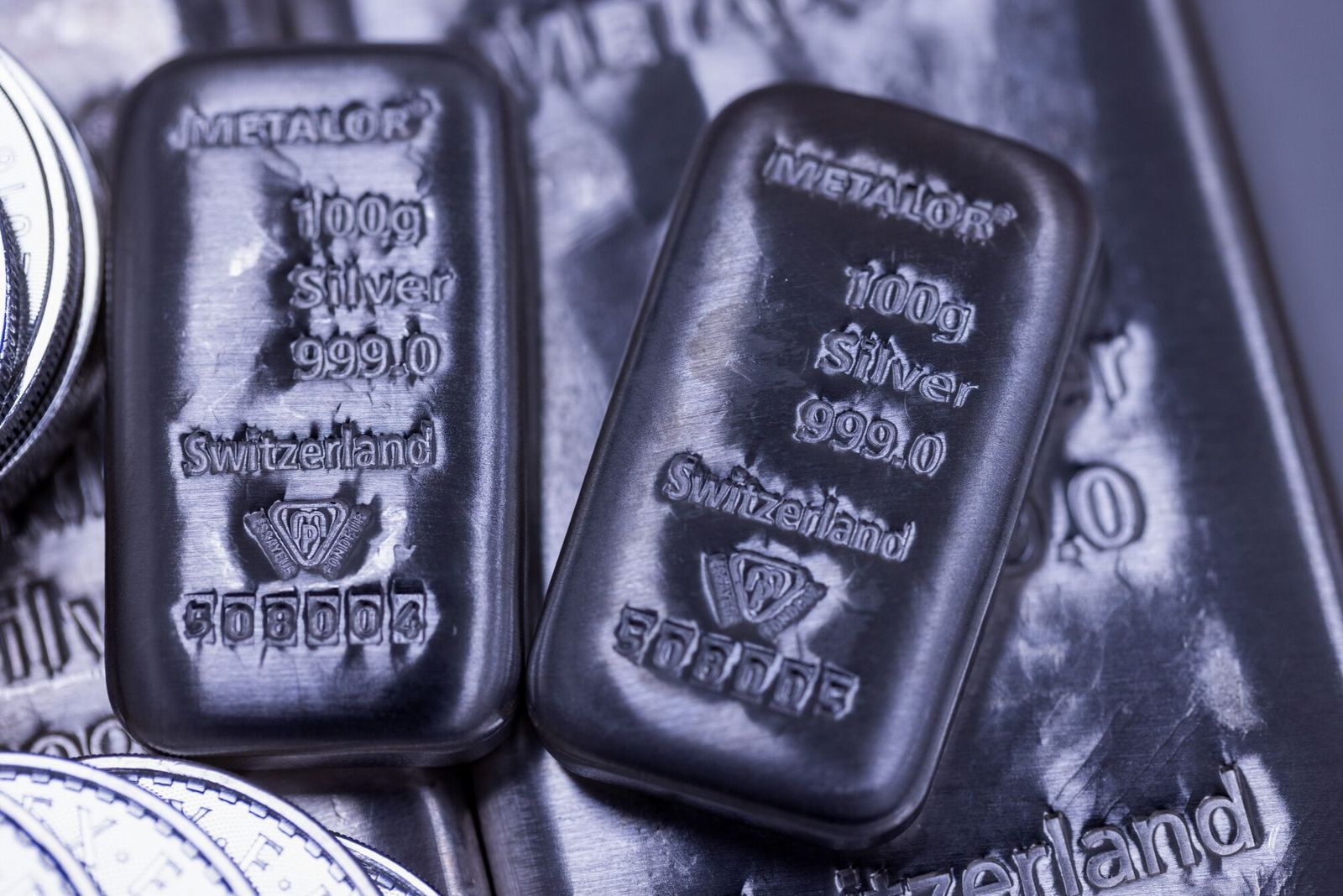 One hundred gram silver bars arranged at Gold Investments Ltd. bullion dealers in London, UK, on Tuesday, May 21, 2024. Silver has soared this year, while gold has hit a series of highs in US dollars on increased haven demand and buying from central banks and Chinese consumers.�Photographer: Chris Ratcliffe/Bloomberg