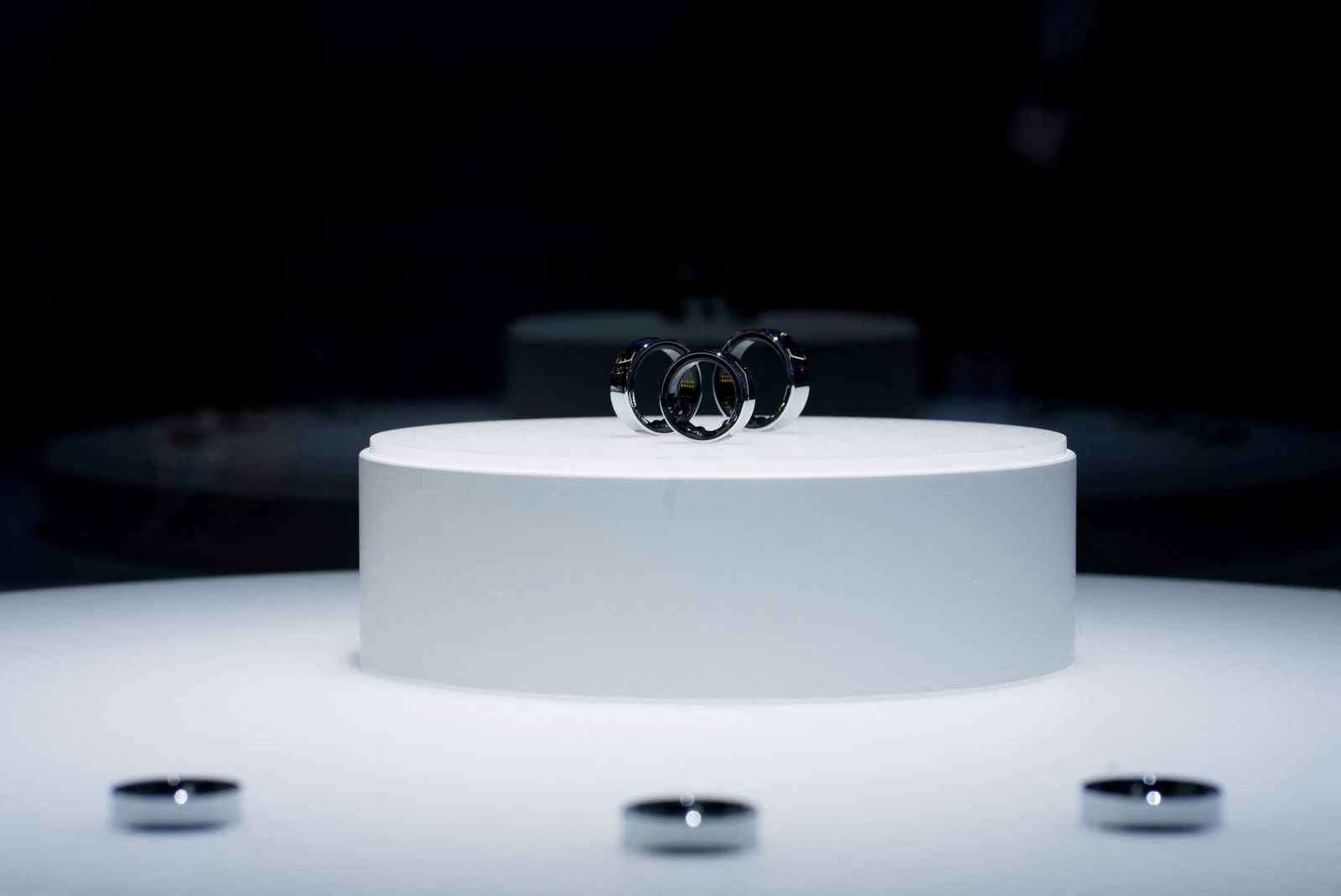 Prototypes of Samsung Galaxy rings are displayed during the Mobile World Congress (MWC), the telecom industry's biggest annual gathering, in Barcelona on February 26, 2024. The world's biggest mobile phone fair throws open its doors in Barcelona with the sector looking to artificial intelligence to try and reverse declining sales. (Photo by PAU BARRENA / AFP)