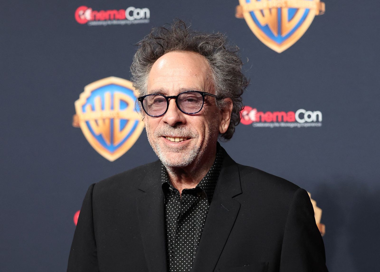 US director Tim Burton poses during a Warner Bros Pictures photo opp as he arrives to promote �Beetlejuice Beetlejuice� during CinemaCon 2024 at Caesars Palace in Las Vegas, Nevada, on April 9, 2024. (Photo by Ronda Churchill / AFP)