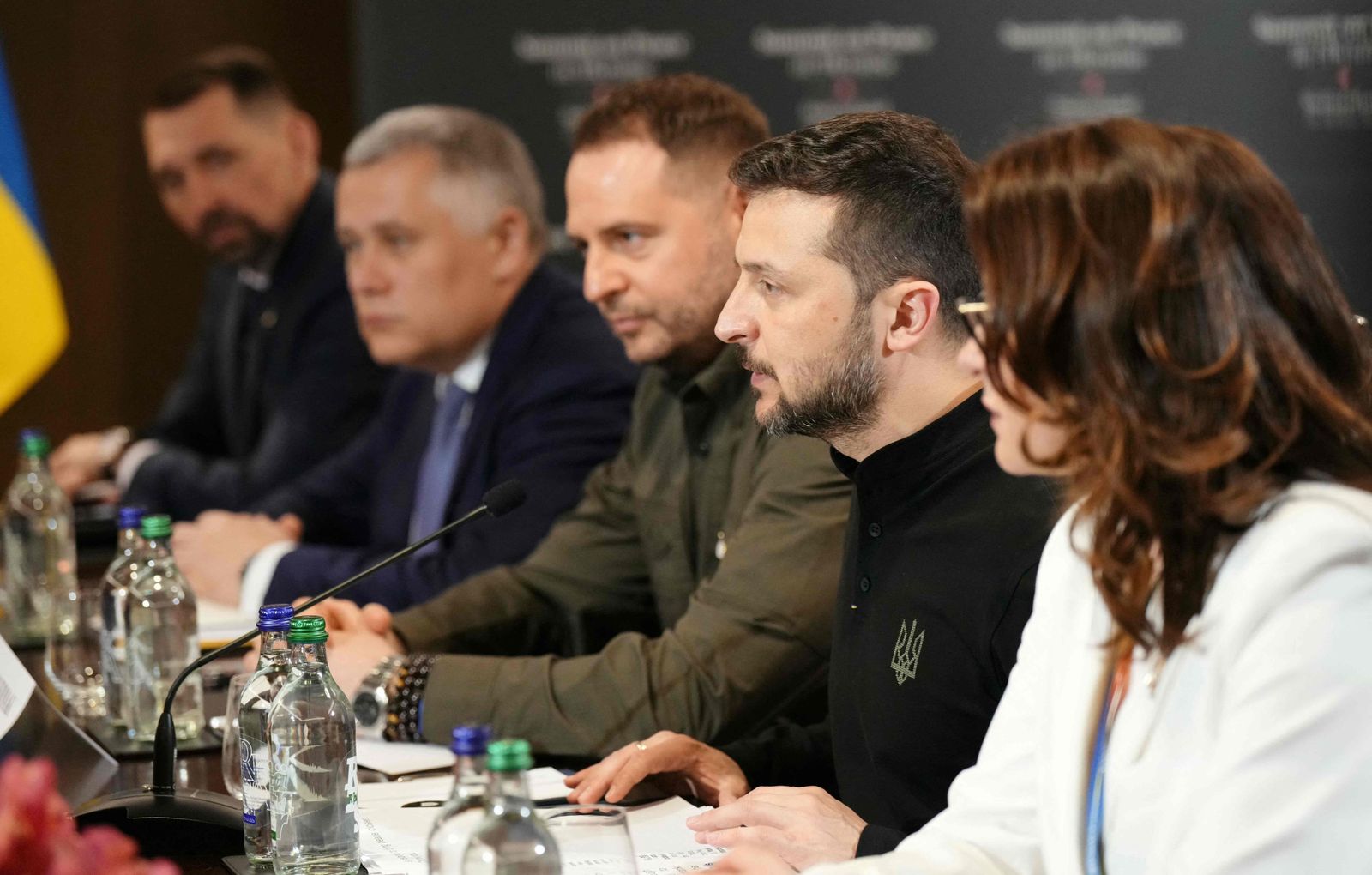 Ukraine's President Volodymyr Zelensky (2R) sits with his delegation as he takes part in talks with US Vice President during a Summit on Peace in Ukraine at the luxury Burgenstock resort, near Lucerne in central Switzerland, on June 15, 2024. The two-day gathering brings together Ukrainian President and more than 50 other heads of state and government, to try to work out a way towards a peace process for Ukraine -- albeit without Russia. (Photo by Dimitar DILKOFF / AFP)