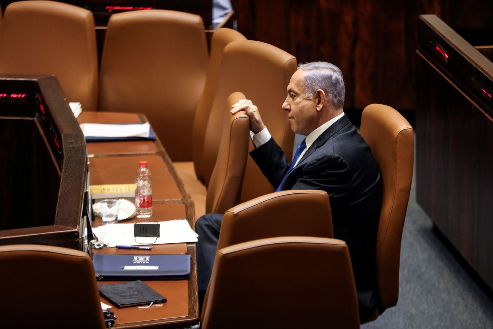 Israeli Prime Minister Benjamin Netanyahu looks on during a special session of the Knesset, Israel's parliament, whereby a confidence vote will be held to approve and swear-in a new coalition government, in Jerusalem - REUTERS