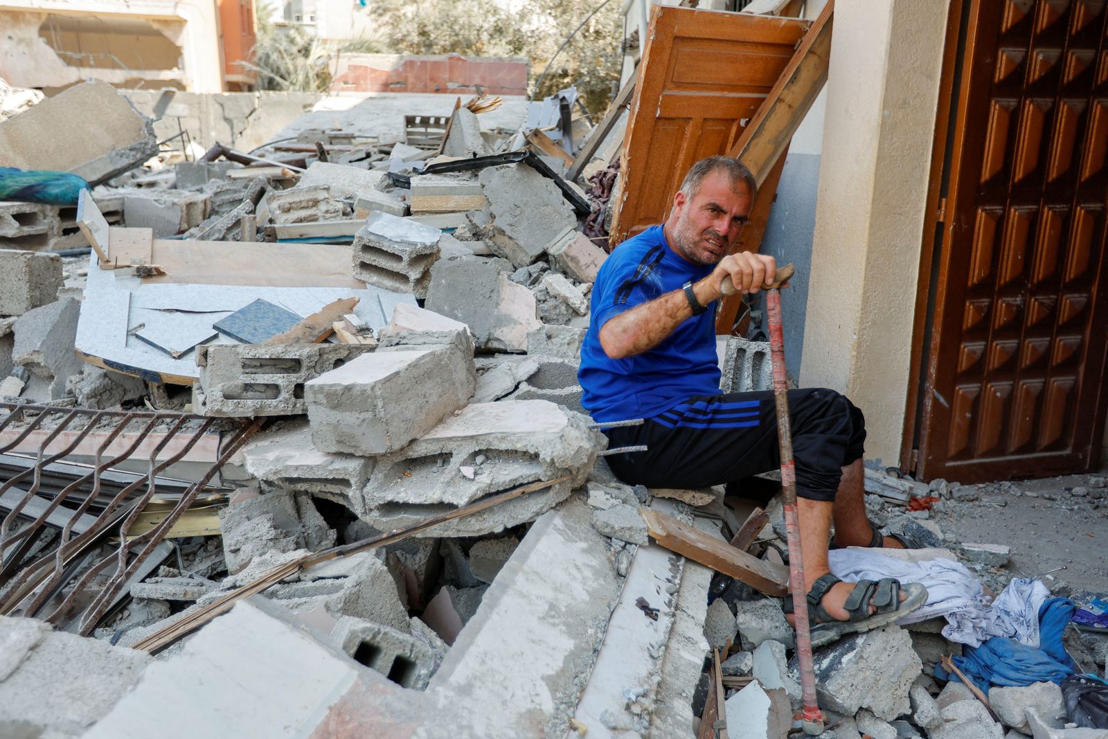  Disabled Palestinians of Shamalakh family lose their house in an Israeli air strike - REUTERS