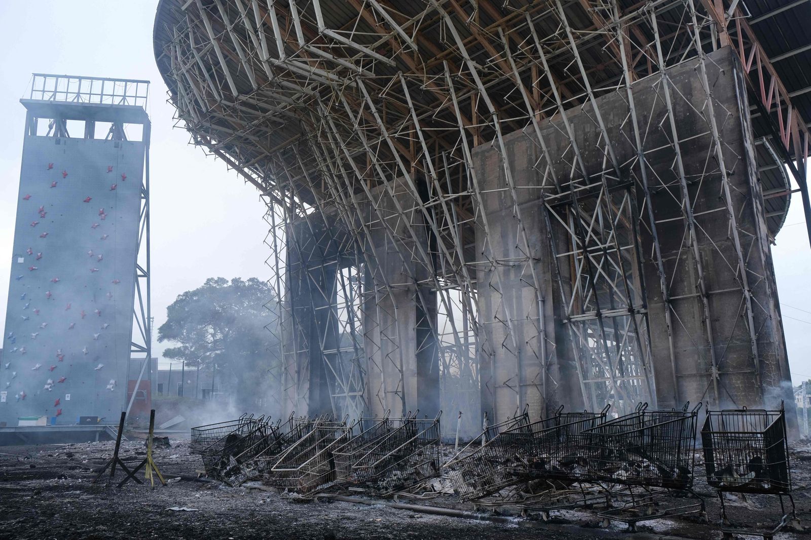 A burnt climbing wall is pictured in the Magenta district of Noumea on May 15, 2024 amid protests linked to a debate on a constitutional bill aimed at enlarging the electorate for upcoming elections of the overseas French territory of New Caledonia. More than 130 people have been arrested in New Caledonia as violent protests rock the French Pacific archipelago, the government said on May 15, 2024, as Paris adopted the constitutional reform that angered pro-independence forces. (Photo by Theo Rouby / AFP)