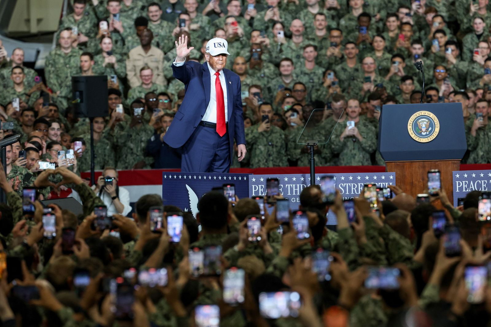 U.S. President Donald Trump gestures on the aircraft carrier USS George Washington during his visit to the U.S. Navy's Yokosuka base in Yokosuka, Japan, October 28, 2025. REUTERS/Kim Kyung-Hoon