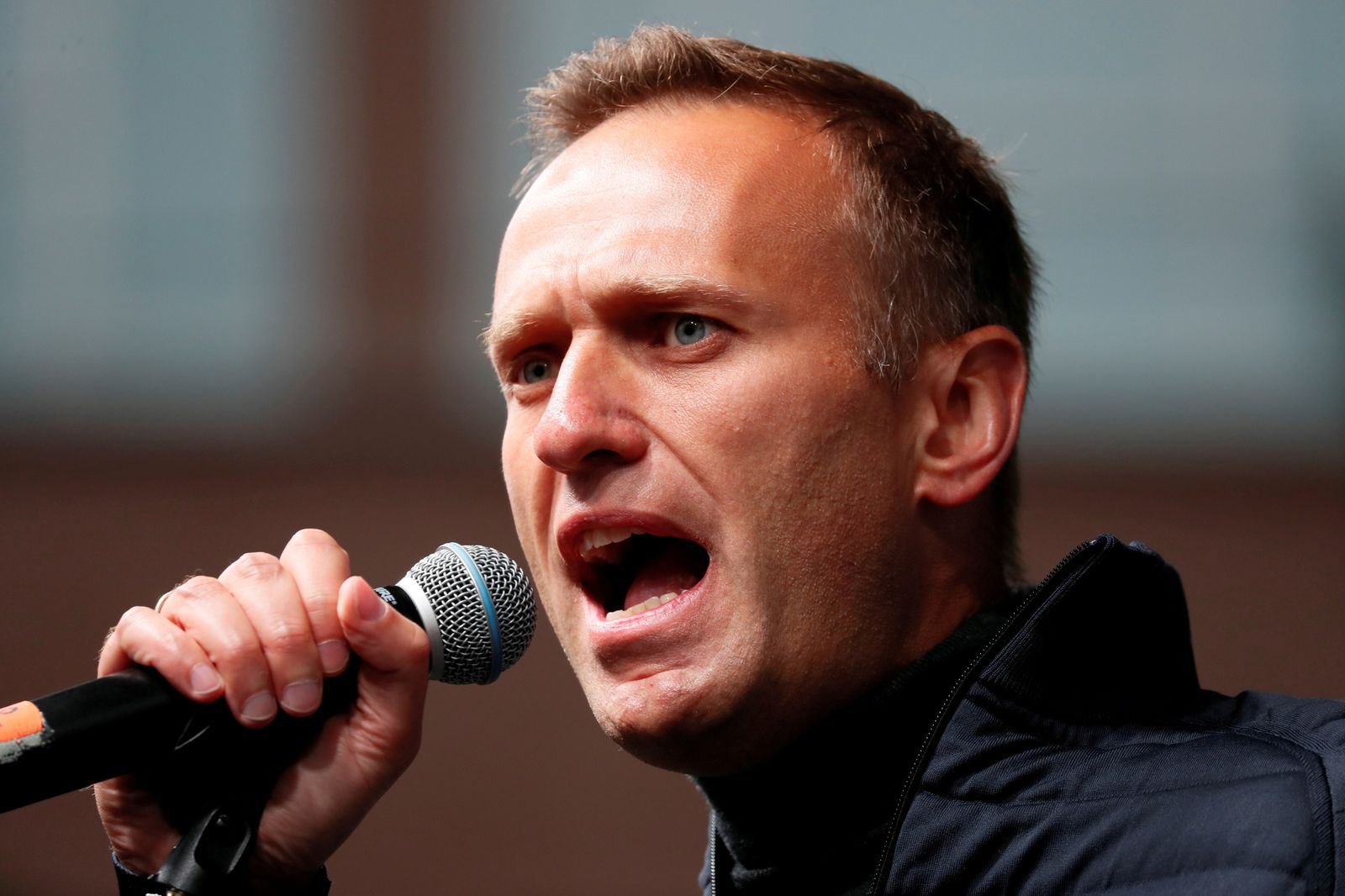 FILE PHOTO: Russian opposition leader Navalny attends a rally to demand the release of jailed protesters in Moscow - REUTERS
